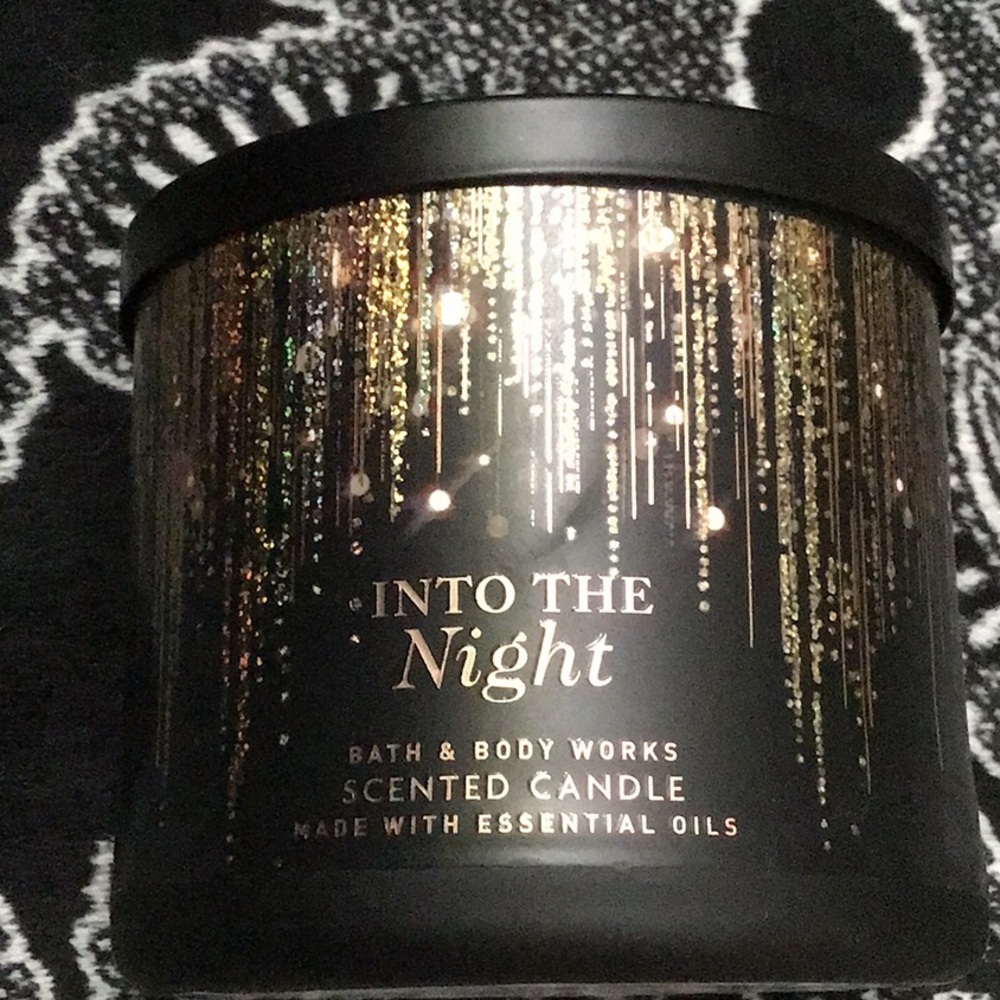 Bath and body works signature collection into the night candle